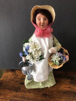 Gardening Lady in Green Floral Dress with Flower Pot, Flower basket and watering can