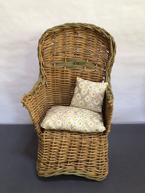 Wicker high back chair with cushion and pillow