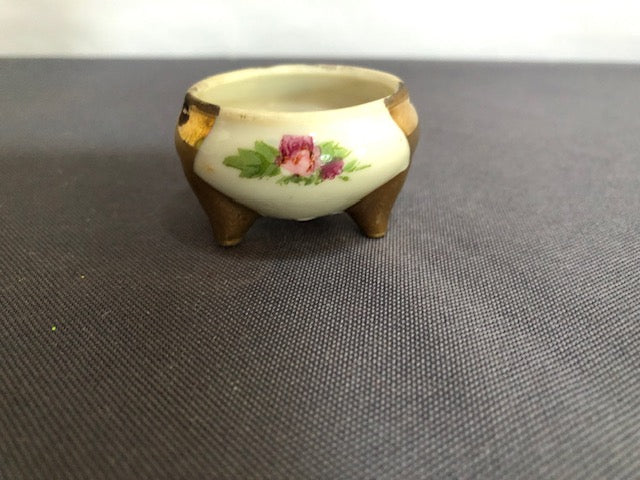 Footed gold bowl with rose design