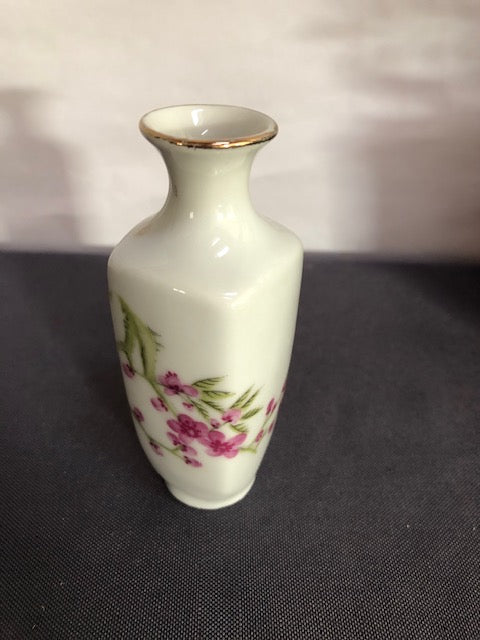 tall ceramic vase with pink printed flower design