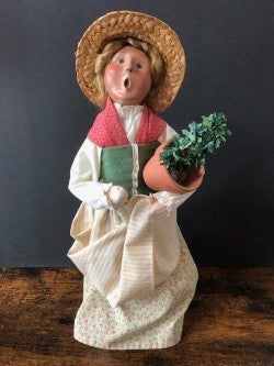 Williamsburg Woman with Topiary Flower Pot