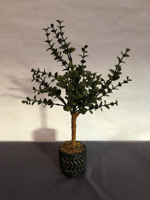 Dark green flocked tree in black stone planter