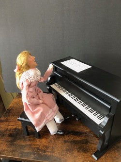 Piano Playing Girl in Pink