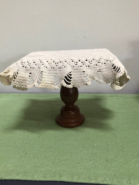Brown Rectangular Table with Dollie Cloth
