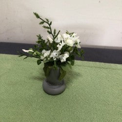 White Flowers in Wooden Urn