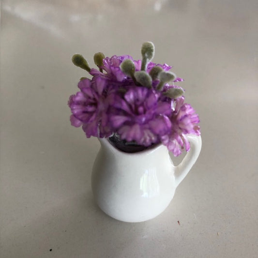 Pitcher with purple flowers