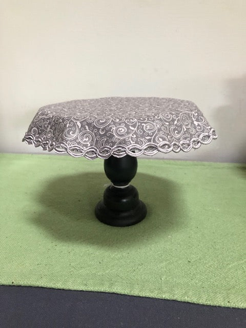 Black Round Table with grey swirl cloth