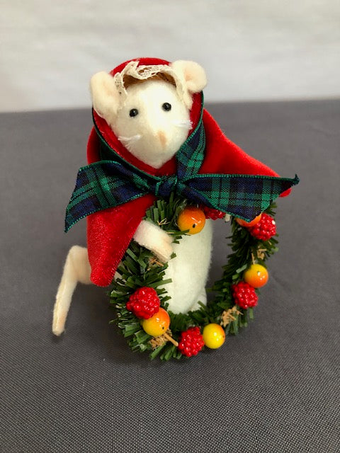 Mouse with red cape and fruit wreath