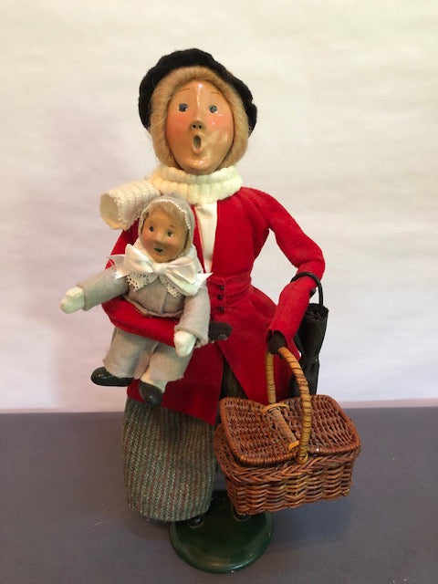 Nanny with child and basket