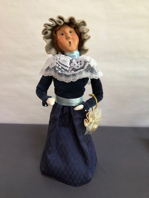 Victorian Woman in navy blue and lace with purse