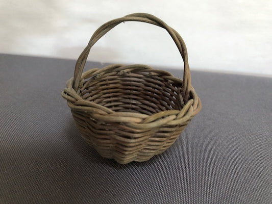 Round woven grey basket