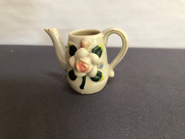 ceramic raised flower watering can