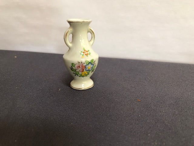 ceramic two handled vase with flower print