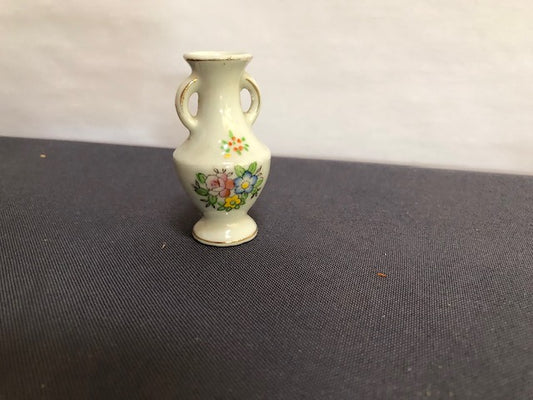 ceramic two handled vase with flower print