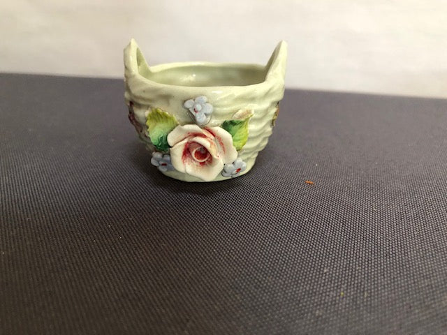 ceramic basket with raised flower