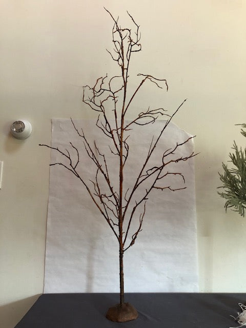 Twig tree with concrete base