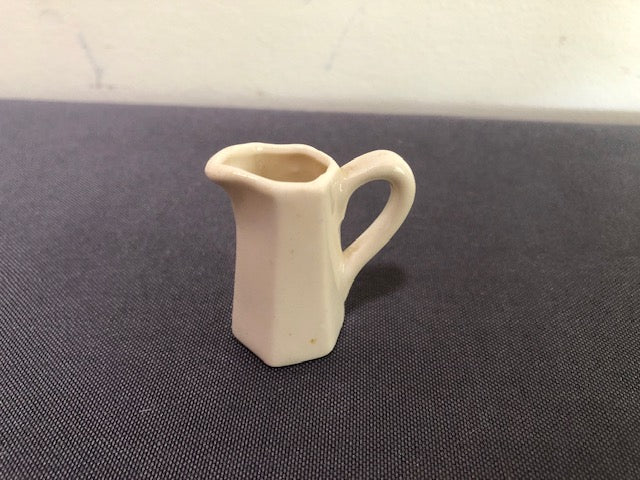 white ceramic pitcher