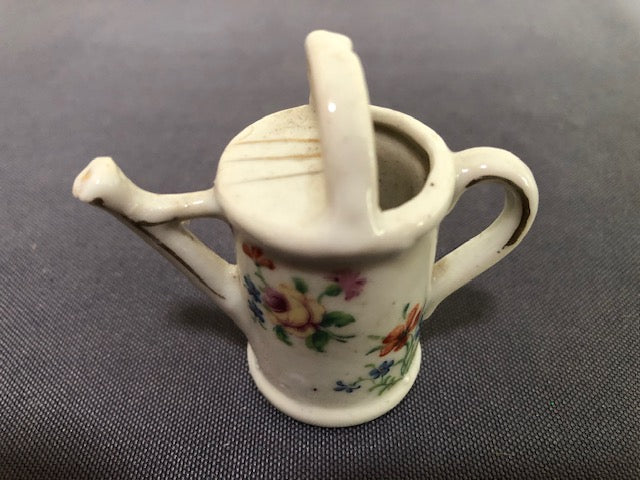 ceramic watering can with printed flower design