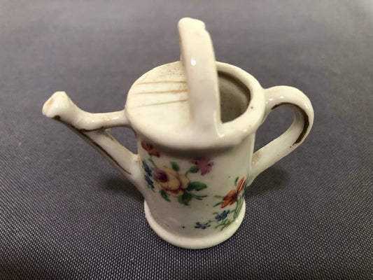 ceramic watering can with printed flower design