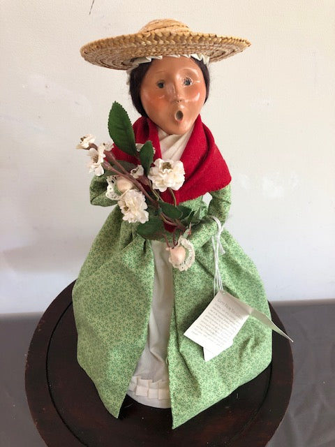 Willaimsburg woman in green with red Shawl and flowers