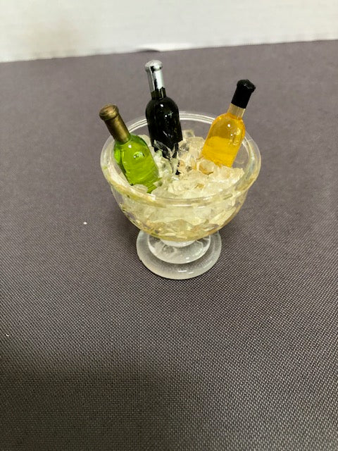 ice bucket with three bottles
