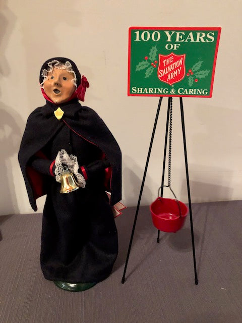 Salvation Army Woman with bell and Collection pot