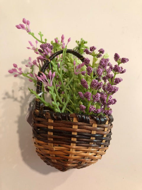 reed basket with flowers